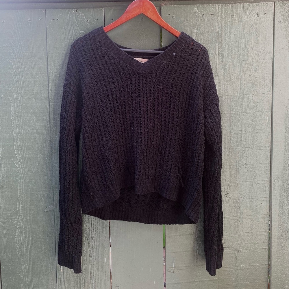 Black v-neck knit sweater